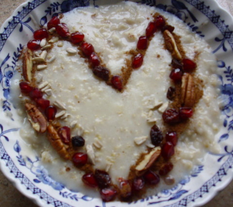 Porridge with heart-shaped cinnamon and nuts