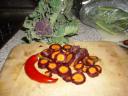 Purple carrots on a chopping board