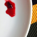 Blob of jam cooling on a plate