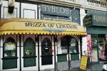 Exterior of Byblos with yellow awning with lettering, Mezza of Lebanon