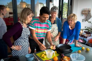 José teaches Argentine cookery class to interested group at Migrateful 